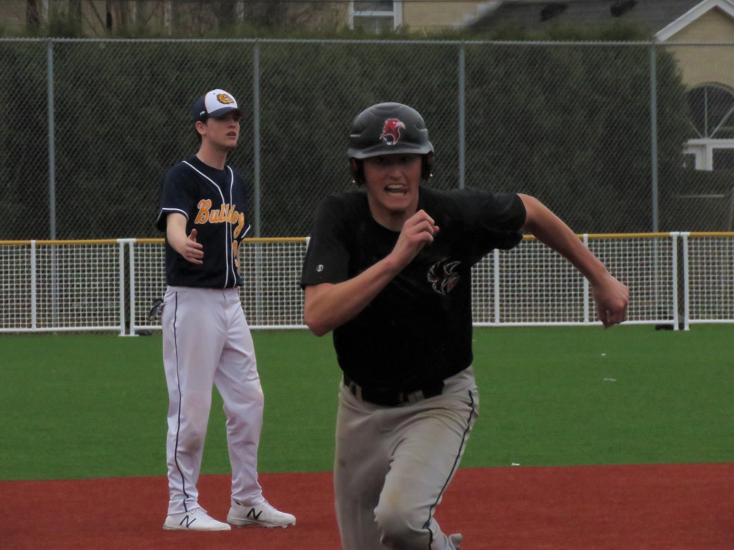 Billy Scullion of the Falcons steals third base for a second time. Scullion had three stolen bases and also scored three runs in the Falcons' 15-7 win over Kenmore East. (Photo by David Yarger)